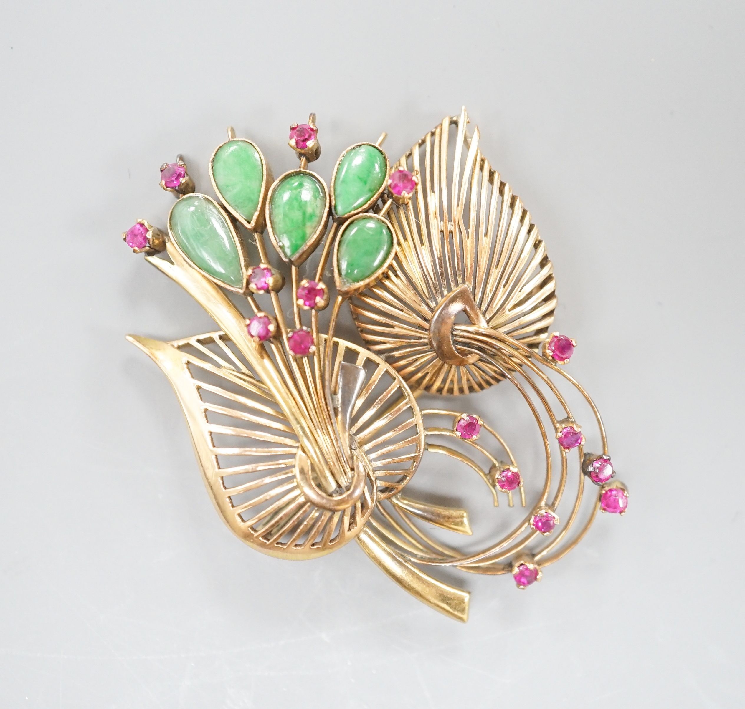 A yellow metal, jade and gem set floral spray brooch, 53mm, gross weight 13.9 grams.